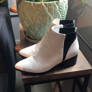 White and black pointed booties